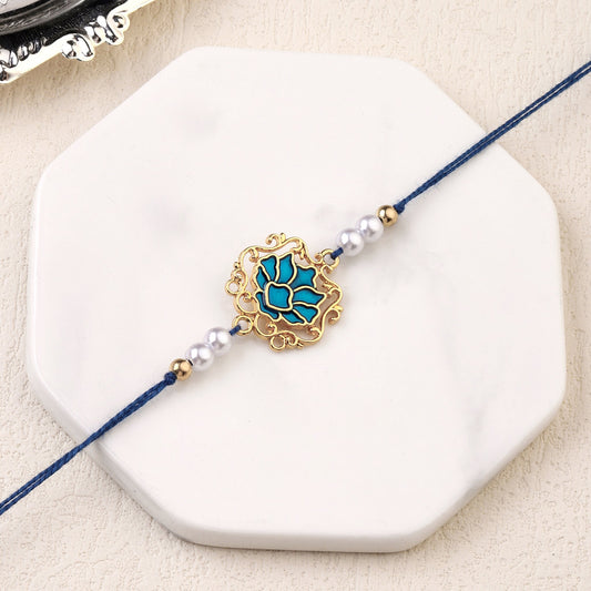 Tranquil Blue Lotus Pearl Rakhi