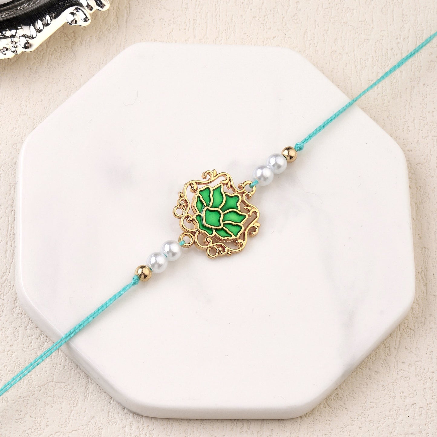 Tranquil Green Lotus Pearl Rakhi