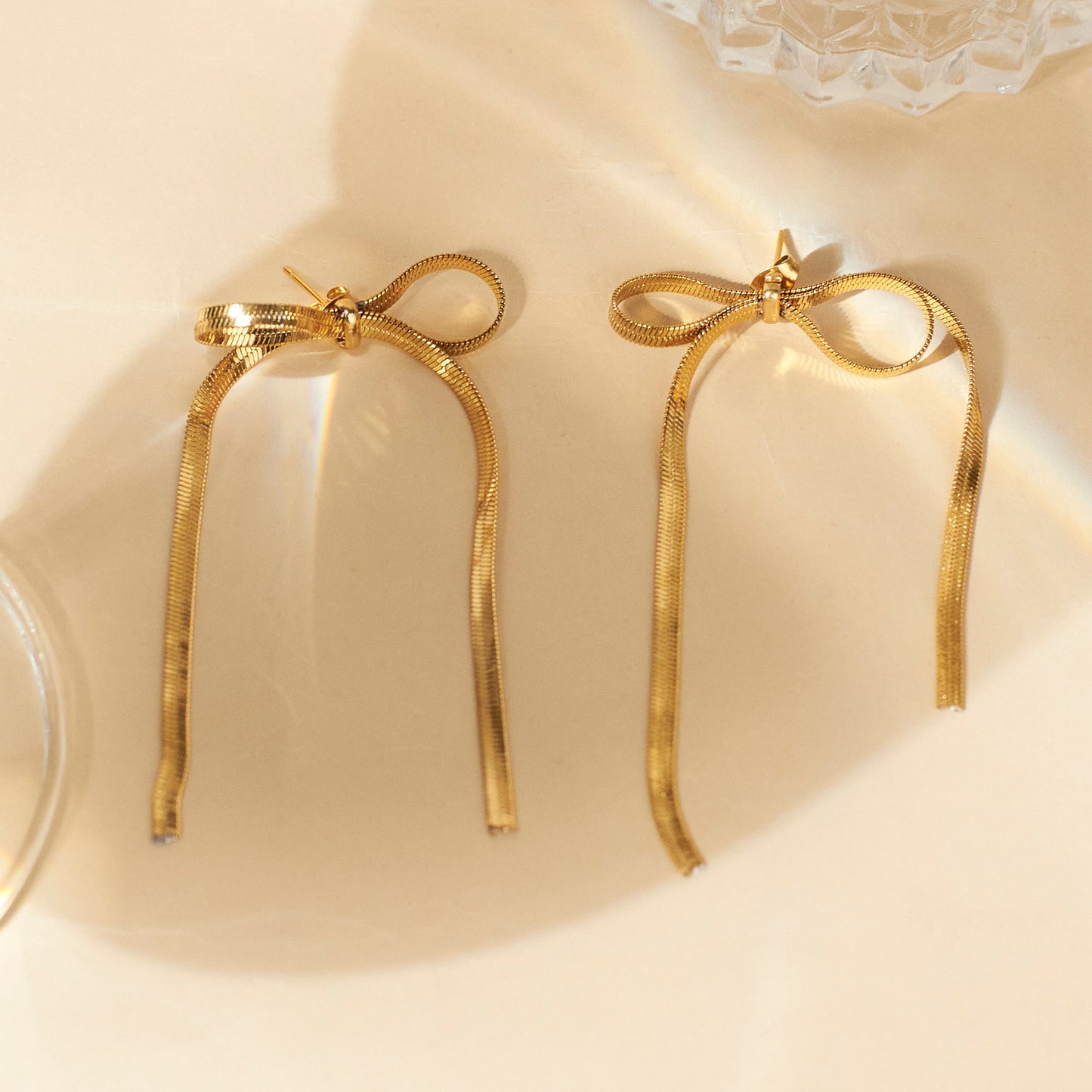 Bow Adorned Gold Earrings